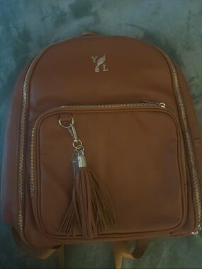 Young Living Brown Leather Tassel Backpack